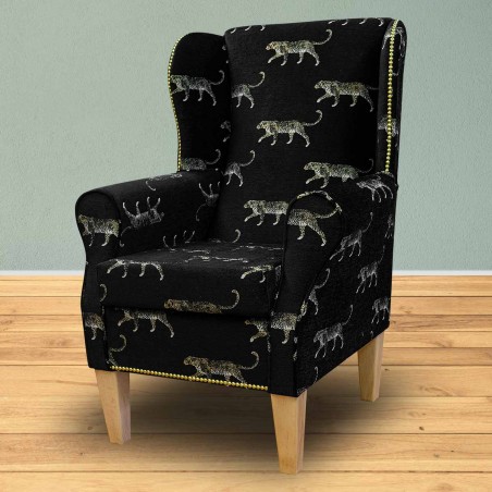 LUXE Standard Wingback Fireside Chair in a Serengeti Leopard Fabric with Half Stud Detail