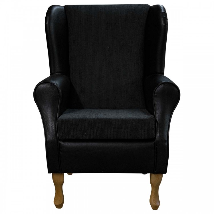 black faux leather fireside arm chair