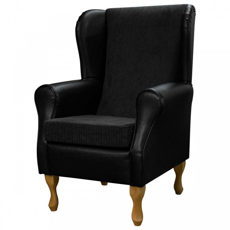 black faux leather and fabric fireside chair