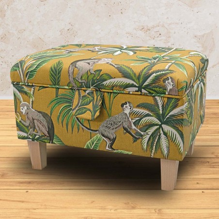 yellow ottoman in monkey fabric