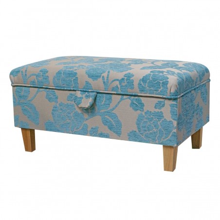 blue footstool in floral fabric