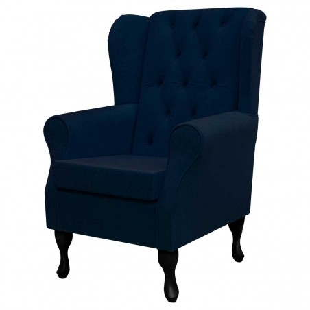 buttoned blue wingback chair