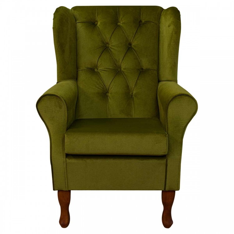 buttoned green velvet armchair